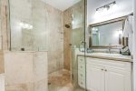Master ensuite features a spacious frameless shower 